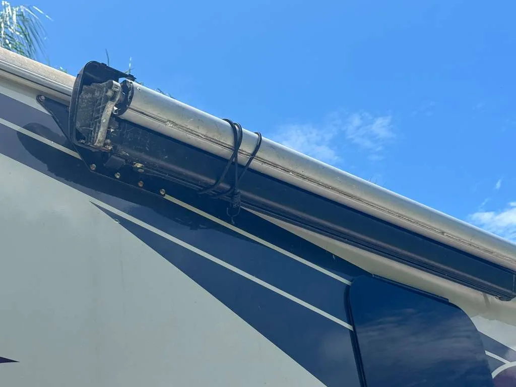 Full replacement of a broken RV awning after a Gulf-coast storm